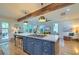 Open kitchen features a large island, seating, stainless steel appliances, and an open-concept design at 340 President St, Charleston, SC 29403