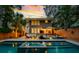 A luxury backyard with a pool and an outdoor kitchen and lounge area for entertaining at 340 President St, Charleston, SC 29403