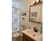 Bathroom with floral artwork, toilet, sink, and vanity at 3415 Pawtucket St, Charleston, SC 29414