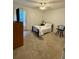 Cozy bedroom features a comfortable bed, dresser, ceiling fan, and sunny window at 3415 Pawtucket St, Charleston, SC 29414