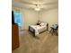 Cozy bedroom with carpeted floors, ceiling fan, and a window that provides natural light at 3415 Pawtucket St, Charleston, SC 29414
