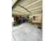 Spacious garage interior with various storage solutions, tools, and equipment at 3415 Pawtucket St, Charleston, SC 29414