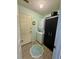 Efficient laundry area with a stacked washer/dryer unit and storage space at 3415 Pawtucket St, Charleston, SC 29414