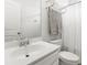 Clean bathroom featuring white vanity, toilet, and shower with neutral-colored shower curtain at 3431 Great Egret Dr, Johns Island, SC 29455