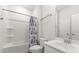 Bright bathroom with a tub/shower combo and a vanity with ample counter space at 3431 Great Egret Dr, Johns Island, SC 29455