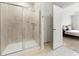 Modern bathroom features a walk-in shower with glass doors and tile surround at 3431 Great Egret Dr, Johns Island, SC 29455