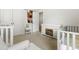 Well-organized Bedroom with a changing table, storage baskets, and neutral decor at 3431 Great Egret Dr, Johns Island, SC 29455