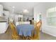 Bright breakfast nook with natural light, wood floors, and space for a small table at 3431 Great Egret Dr, Johns Island, SC 29455