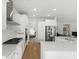 Modern kitchen with white cabinets, stainless steel appliances, and stylish countertops at 3431 Great Egret Dr, Johns Island, SC 29455