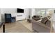 Spacious living room boasts ample seating, natural light, and an airy feel at 3431 Great Egret Dr, Johns Island, SC 29455