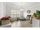 Spacious playroom with hardwood floors, bright lighting, and ample storage at 3431 Great Egret Dr, Johns Island, SC 29455
