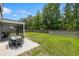 Expansive backyard with outdoor seating and an enclosed, wood perimeter fence at 4007 Oxeye, Johns Island, SC 29455