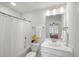 Clean bathroom featuring a bathtub, toilet, vanity, and mirror at 4007 Oxeye, Johns Island, SC 29455