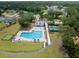 An aerial view showcases the community pool, tennis courts, and playground, emphasizing the area's recreational amenities at 4007 Oxeye, Johns Island, SC 29455