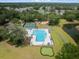 Aerial view of the community pool, tennis courts, playground, and a putting green, ideal for active community engagement at 4007 Oxeye, Johns Island, SC 29455