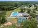 Aerial view shows the community's pool, putting green, and tennis courts, showcasing the various recreational opportunities at 4007 Oxeye, Johns Island, SC 29455