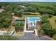 An aerial view of the community pool, tennis courts, and playground shows the variety of recreational activities at 4007 Oxeye, Johns Island, SC 29455