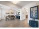 Bright dining room with hardwood floors, chandelier, and elegant decor at 4007 Oxeye, Johns Island, SC 29455