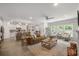 Bright and airy open-concept living area showcasing stylish furnishings and hardwood flooring at 4007 Oxeye, Johns Island, SC 29455