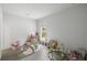 Bright playroom featuring light gray wood floors and lots of natural light from a single window at 4007 Oxeye, Johns Island, SC 29455
