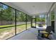 Relaxing screened-in porch with a backyard view and outdoor seating at 4007 Oxeye, Johns Island, SC 29455