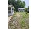 Spacious backyard featuring a shed and greenery at 4029 Karen Dr, North Charleston, SC 29405