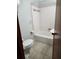Bathroom featuring a toilet, bathtub, and built-in soap dish at 4029 Karen Dr, North Charleston, SC 29405