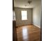 Bedroom with hardwood floors, neutral walls, natural light and a window at 4029 Karen Dr, North Charleston, SC 29405