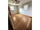 This bedroom features hardwood floors, neutral walls, ceiling fan and natural light at 4029 Karen Dr, North Charleston, SC 29405