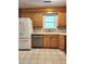 Kitchen featuring tile flooring, light wood cabinets, and modern stainless steel appliances at 4029 Karen Dr, North Charleston, SC 29405