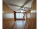 Living room with wood paneling and a ceiling fan at 4029 Karen Dr, North Charleston, SC 29405