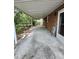Covered patio with concrete flooring, and backyard access, perfect for outdoor relaxation at 4029 Karen Dr, North Charleston, SC 29405