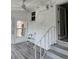 Sunroom with white brick walls and lots of light, plus a small ladder for repairs at 4029 Karen Dr, North Charleston, SC 29405