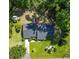 Aerial view of a home showing the roof, surrounding yard, landscaping, and patio at 411 Dogwood Circle, Summerville, SC 29485