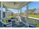 Relaxing back porch with comfortable seating, perfect for enjoying outdoor living and entertaining guests at 414 Hamlet Cir, Goose Creek, SC 29445
