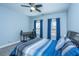 Inviting bedroom features a ceiling fan, a desk, and chair, enhanced by natural light at 414 Hamlet Cir, Goose Creek, SC 29445