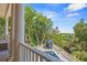 Relaxing porch overlooking a pool and ocean view at 43 Surfsong Rd, Kiawah Island, SC 29455