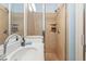 Bathroom featuring marble countertop, tiled shower, and luxurious amenities for a spa-like experience at 43 Surfsong Rd, Kiawah Island, SC 29455
