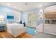 Charming bedroom with hardwood floors, a ceiling fan, and twin beds with a bunk at 43 Surfsong Rd, Kiawah Island, SC 29455
