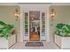 Warm and inviting entryway with double doors and a glimpse into the spacious living area at 43 Surfsong Rd, Kiawah Island, SC 29455