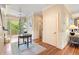 Welcoming foyer with hardwood floors, elegant decor, and natural light at 43 Surfsong Rd, Kiawah Island, SC 29455