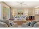 Bright living room featuring modern furnishings, neutral color palette, hardwood floors, and ample natural light at 43 Surfsong Rd, Kiawah Island, SC 29455