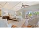 Spacious main bedroom with vaulted ceilings, seating area, and access to a private balcony at 43 Surfsong Rd, Kiawah Island, SC 29455