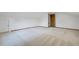 Bedroom featuring carpeted flooring, white walls, a door, and a closet at 436 Fox Hunt Rd, Goose Creek, SC 29445