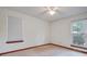 Bedroom featuring carpeted flooring, two windows, and a ceiling fan with a light at 436 Fox Hunt Rd, Goose Creek, SC 29445