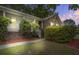 Charming brick home featuring a well-manicured lawn and welcoming front porch at 436 Fox Hunt Rd, Goose Creek, SC 29445