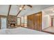 Open living room with vaulted ceilings, fireplace and access to backyard at 436 Fox Hunt Rd, Goose Creek, SC 29445