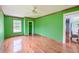 A bedroom boasts hardwood floors, a ceiling fan, a closet, and a window offering natural light at 444 Clarine Dr, Goose Creek, SC 29445