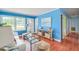 Bright living area showcasing hardwood floors and comfortable seating at 444 Clarine Dr, Goose Creek, SC 29445
