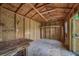 Spacious shed interior featuring plywood walls, a work bench and ample room for storage or hobbies at 444 Clarine Dr, Goose Creek, SC 29445